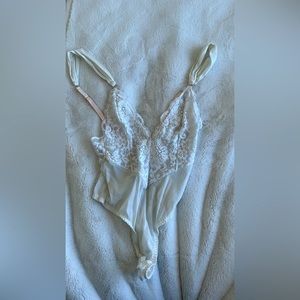 We are body suit from revolve worn once